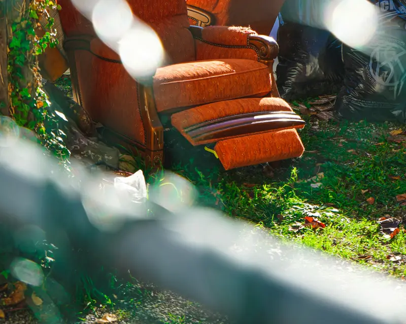 Old armchair waiting for furniture removal by Waste Bristol
