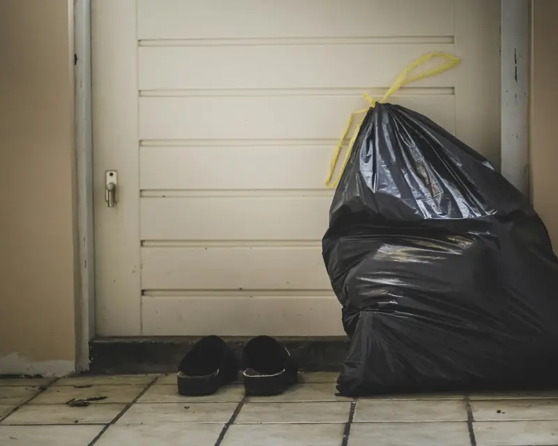 Black rubbish bags waiting for collection by Waste Bristol