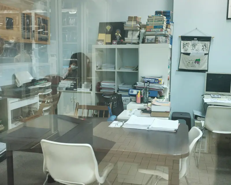 Cluttered room full of furniture before a house clearance by Waste Bristol